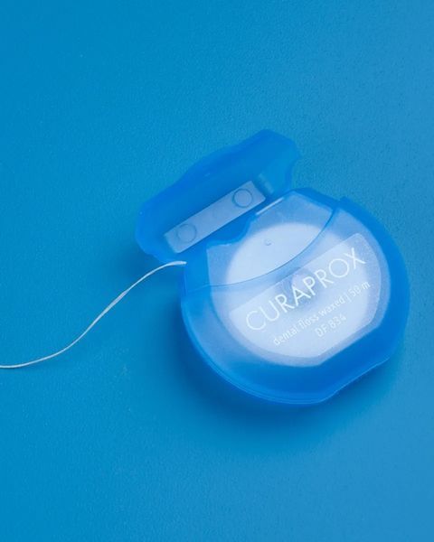 Зубная нить Curaprox вощеная с ароматом мяты (Швейцария), 50 м НФ-00000070 фото